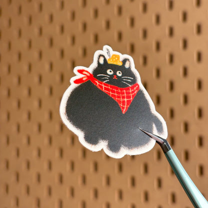 Round Black Cat With Red Scarf